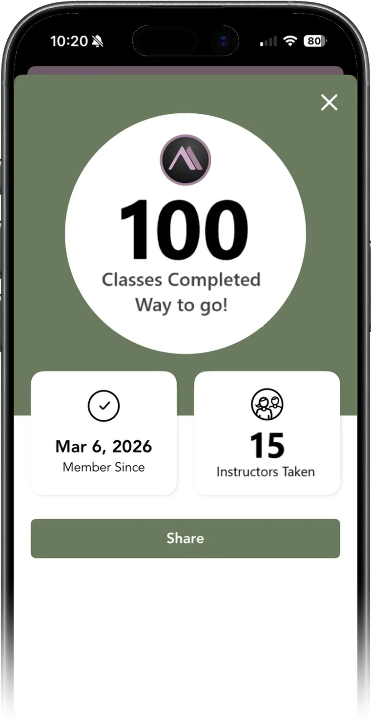 The ALIHA Studio app showing 100 classes completed and member milestones
